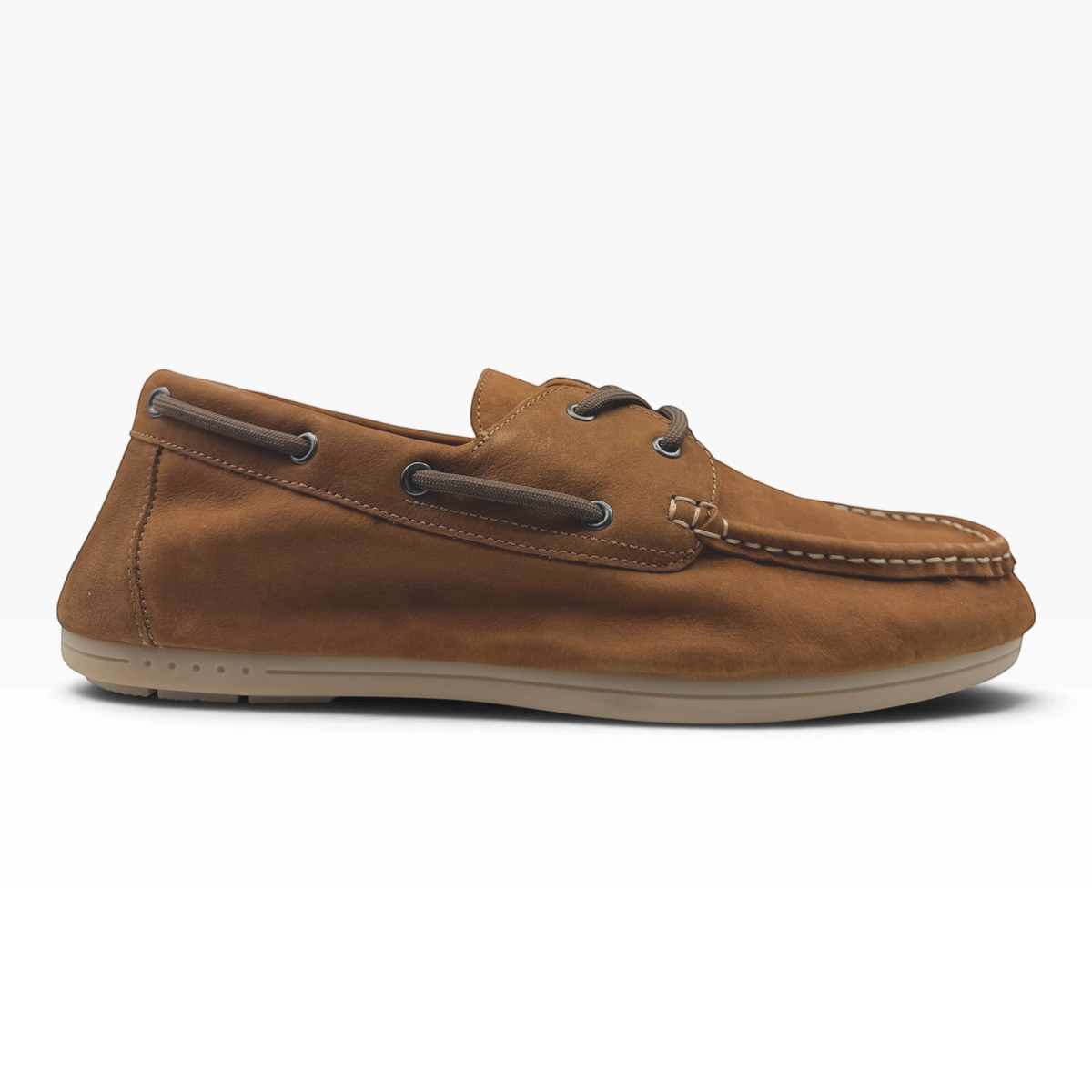 The Shoe Shop Fen boat shoe in tan nubuck leather with moccasin stitching, rawhide laces, and a rubber sole.
