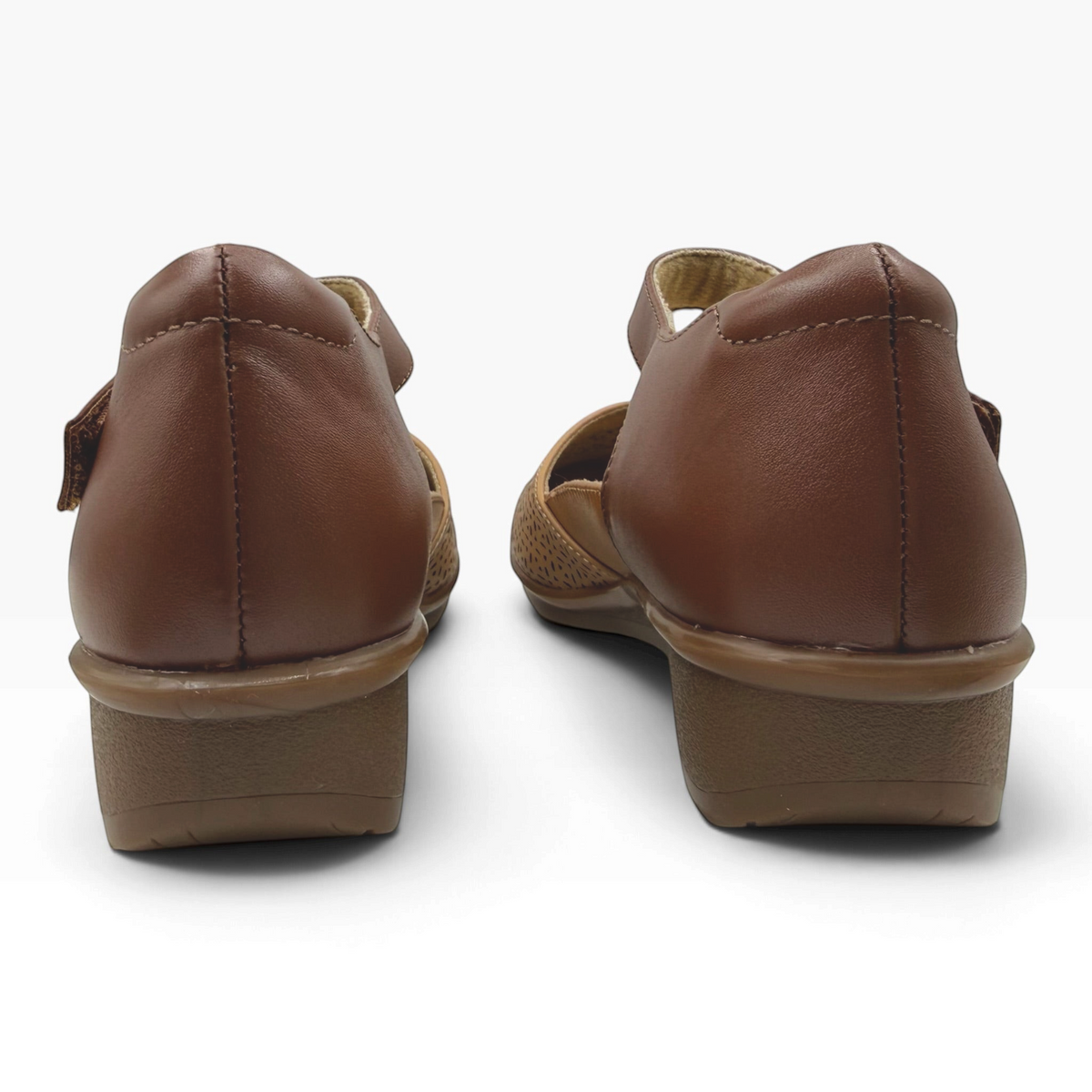 The Shoe Shop Osaka wide brown leather sandals with low wedge heels and adjustable ankle straps, back view.