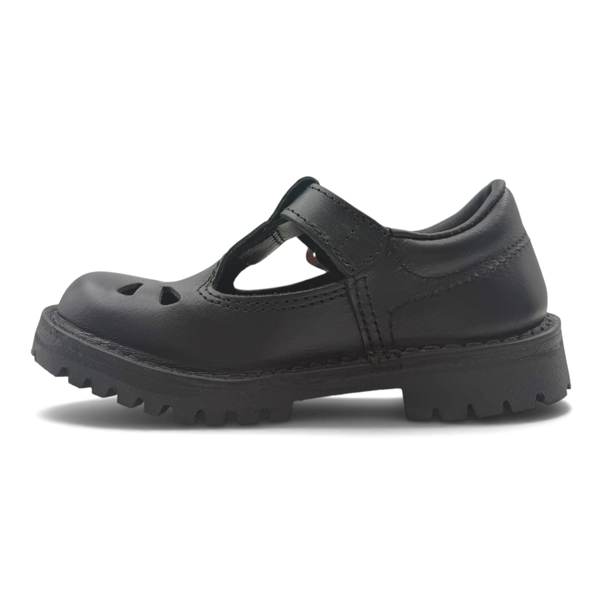 The Shoe Shop Rio black leather T-bar school shoe with a durable rubber lug sole, side view.