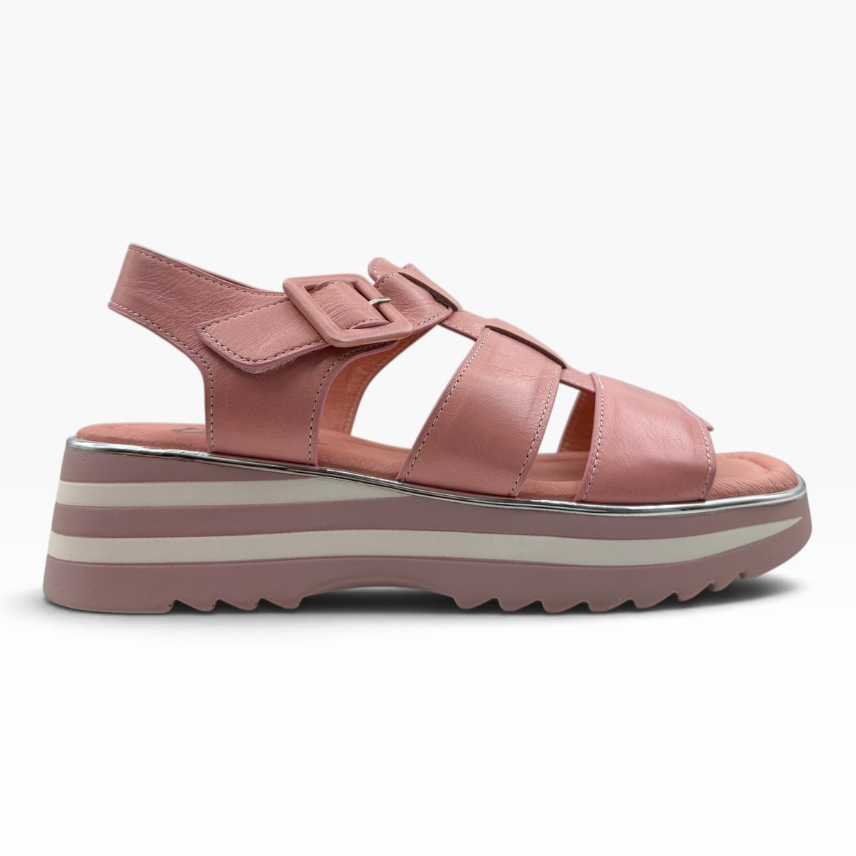The Shoe Shop pink leather platform sandal with wide straps, adjustable ankle buckle, and metallic trim layered sole.
