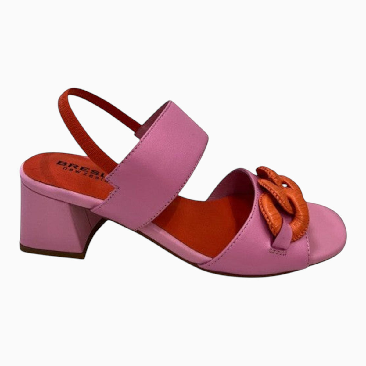The Shoe Shop Alaska slingback heel in pink and orange leather with a decorative chain detail and block heel.