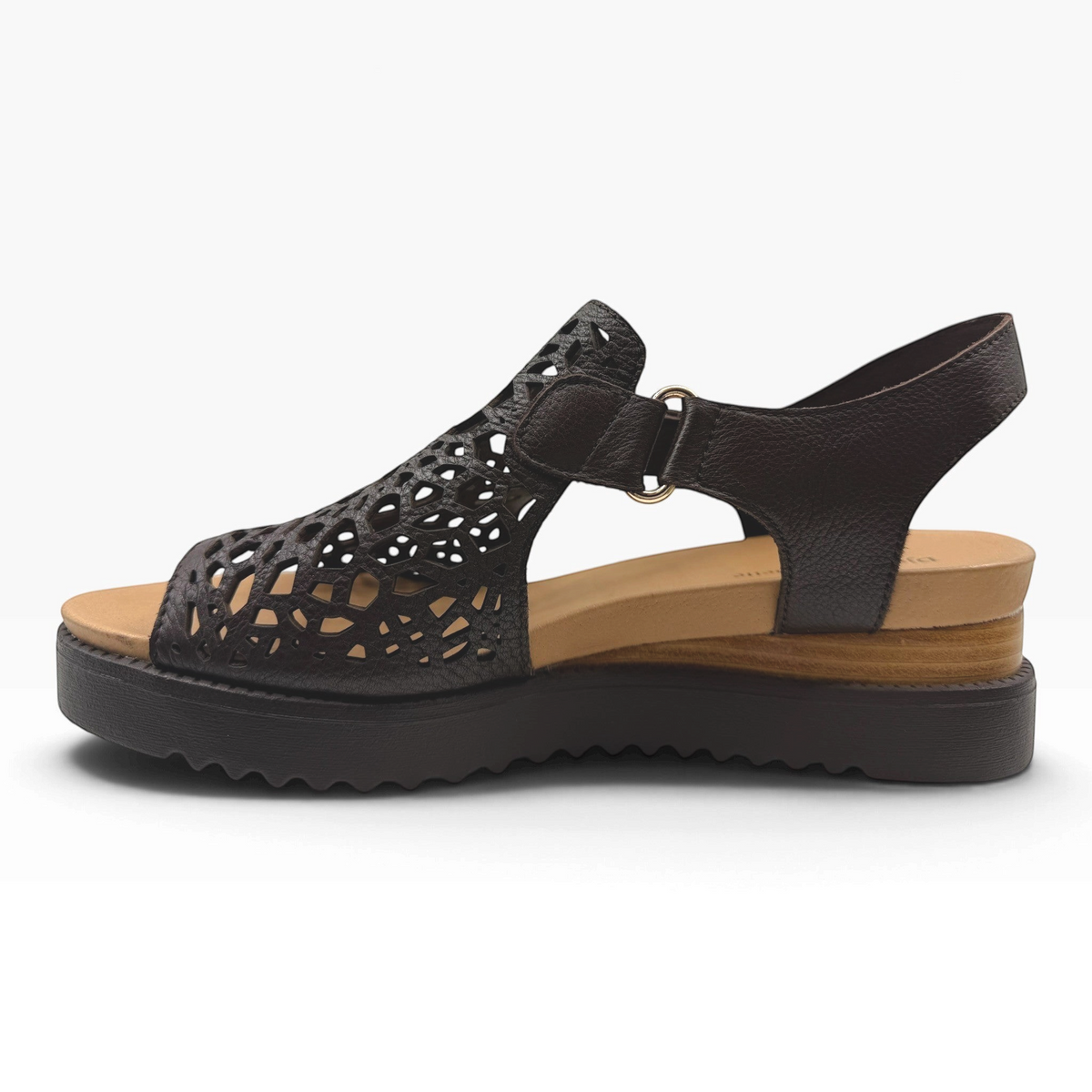 The Shoe Shop Ansh almond beige platform sandal with a dark brown laser-cut leather upper and adjustable strap