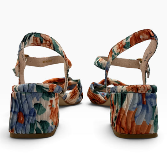 The Shoe Shop Aloof floral print block heel sandals with elasticated slingback straps in beige and navy tones.