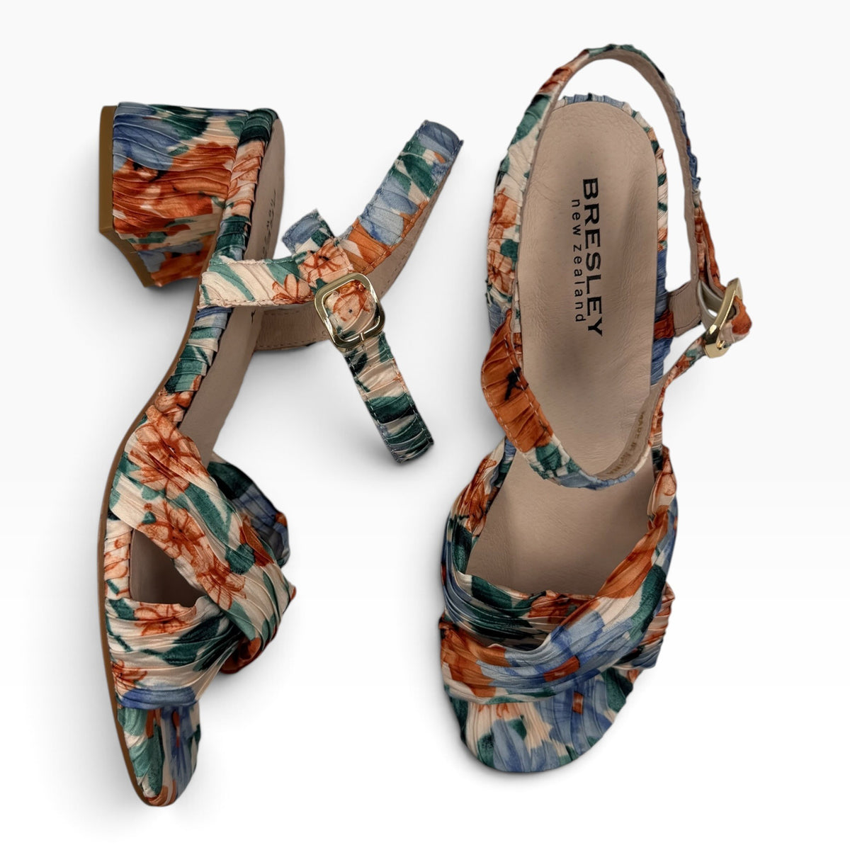The Shoe Shop Aloof beige floral block heel sandals with a pleated strap design and adjustable ankle buckle