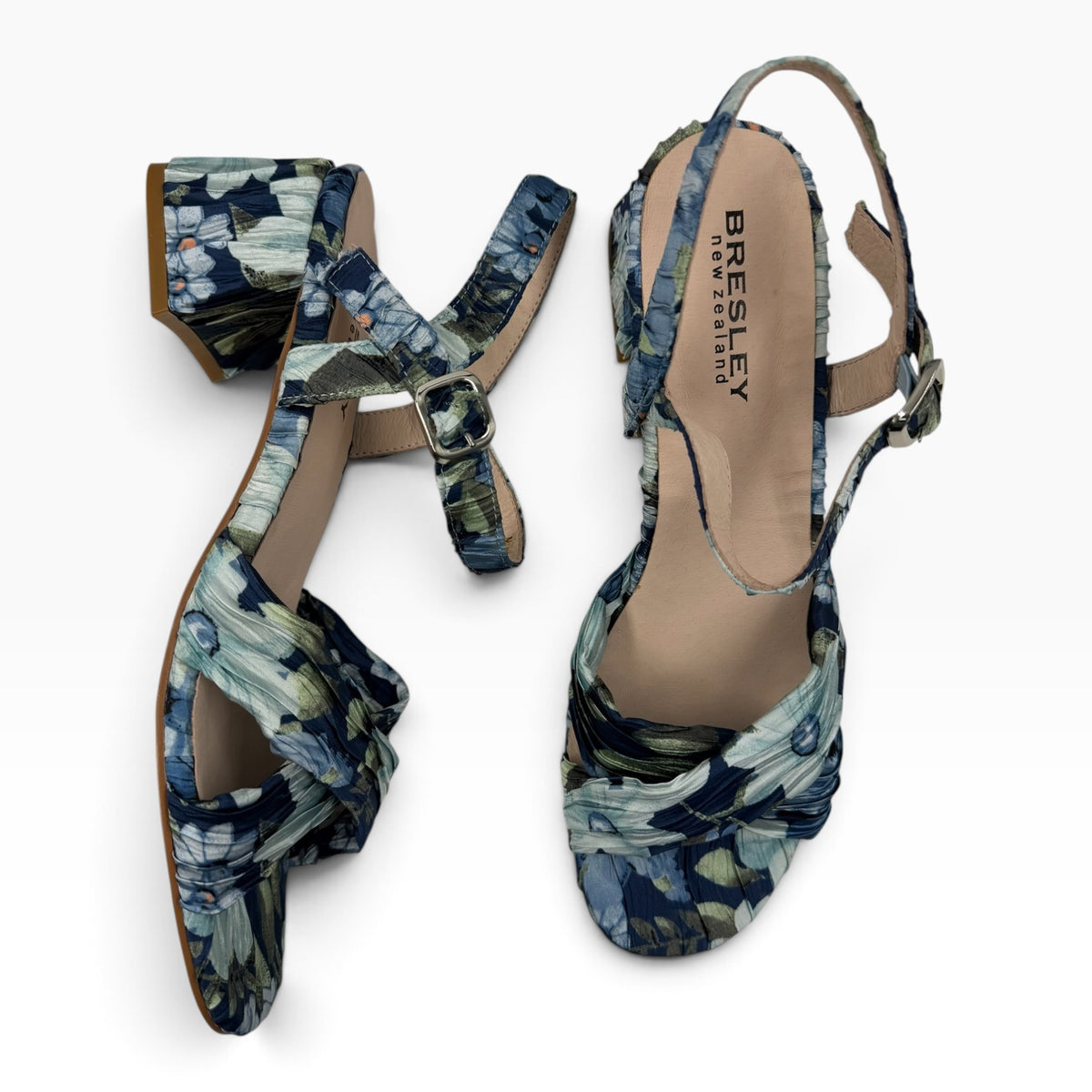 The Shoe Shop Aloof Heel in navy floral print with a low block heel and adjustable ankle strap