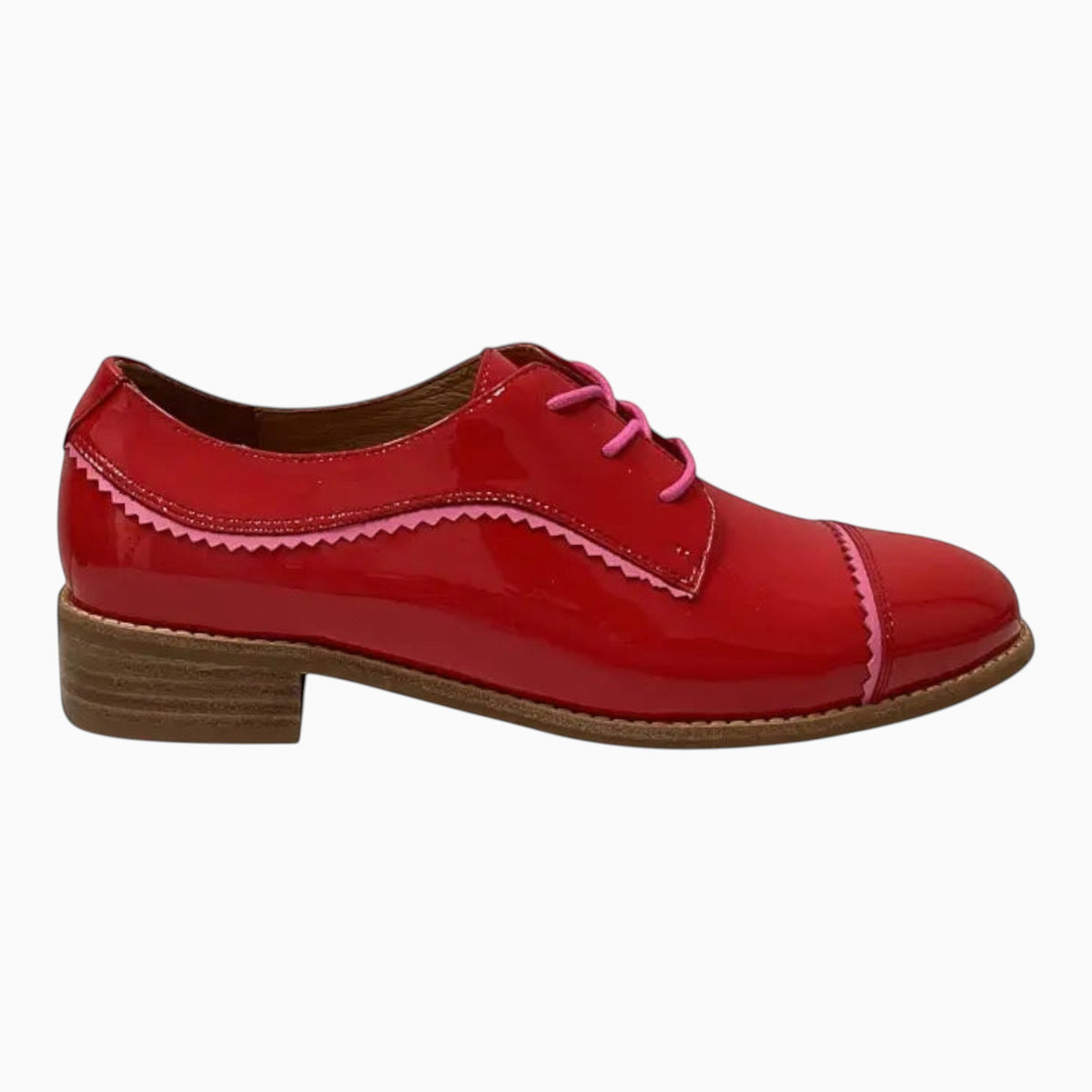 The Shoe Shop Alpopo red patent leather lace-up flat shoe with pink scalloped trim and a low block heel.
