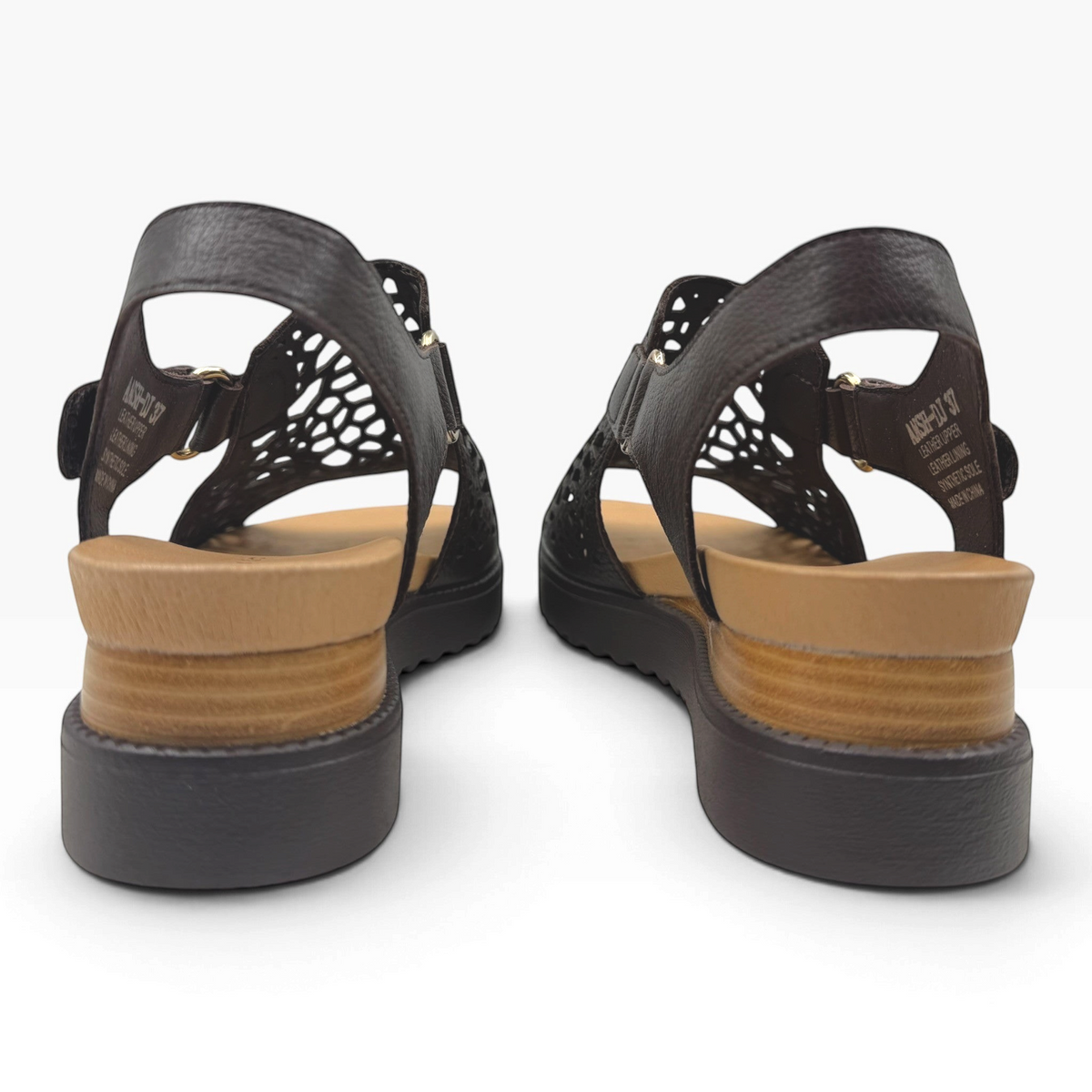The Shoe Shop Ansh sandals in dark brown with laser-cut detailing, almond-toned footbed, and low block heel.