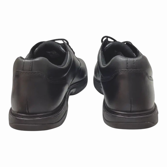 The Shoe Shop Ascent Apex Senior D black leather school shoes showing the heel and back view with rubber outsoles.