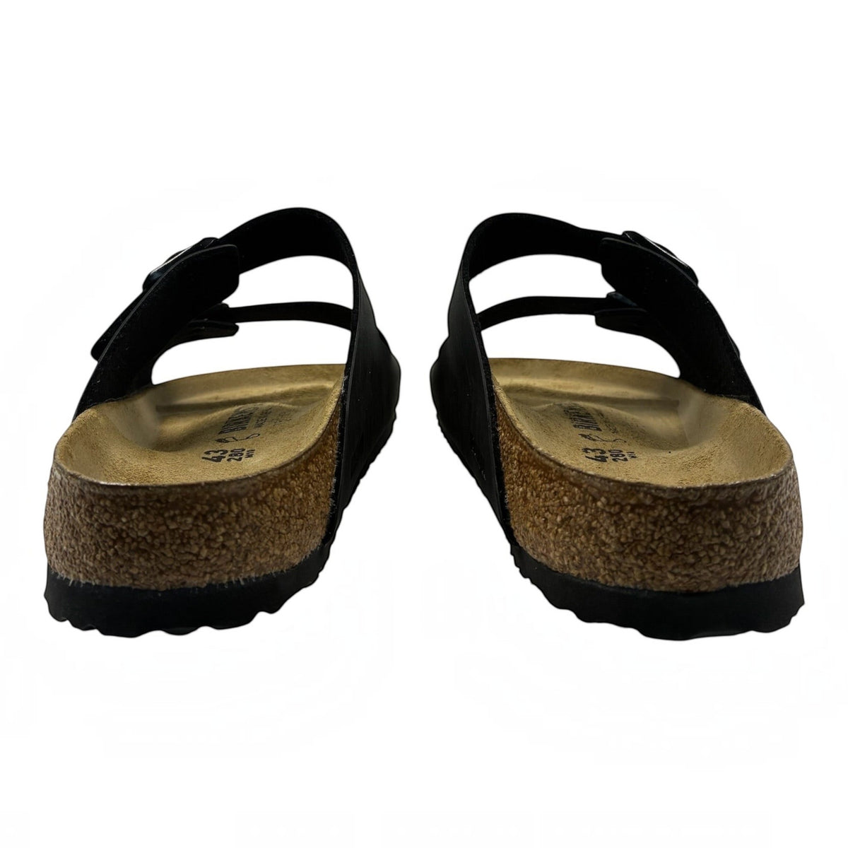 The Shoe Shop Arizona Birko-Flor black two-strap sandals with cork-latex footbeds and EVA soles viewed from the back.