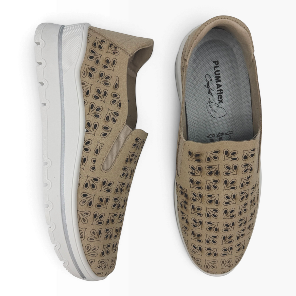 The Shoe Shop A40042 casual flat slip-on shoes in beige with laser-cut leaf patterns and white comfort soles.