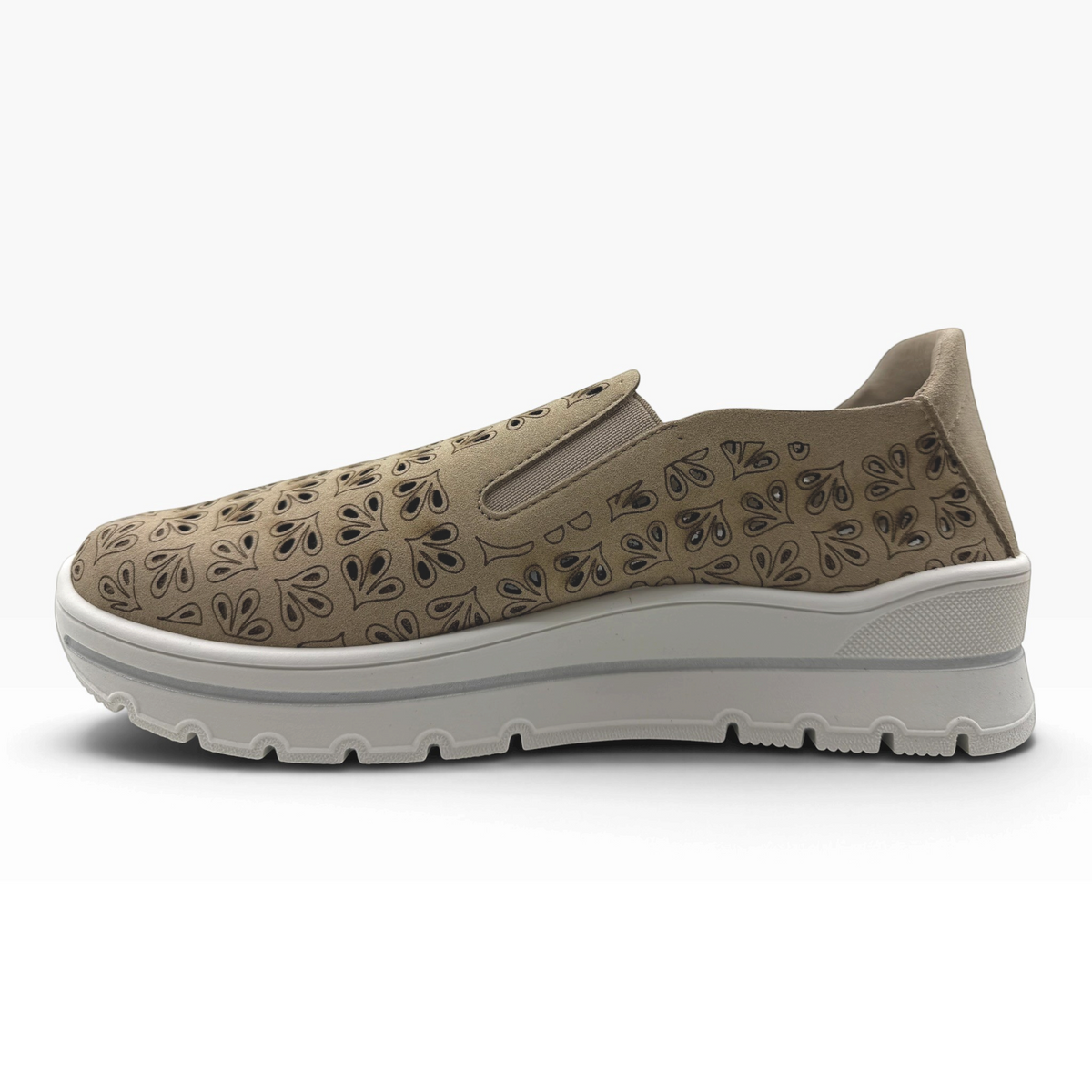 The Shoe Shop A40042 casual slip-on flat in beige with laser-cut leaf patterns and a thick white platform sole.