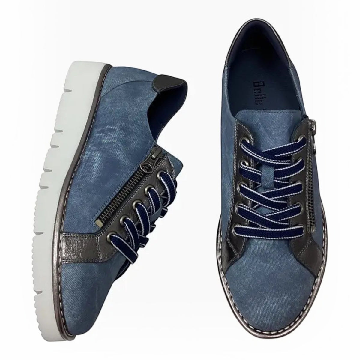 The Shoe Shop Belle Scarpe Roman Shoe featuring blue leather, metallic accents, side zip, and white platform sole.