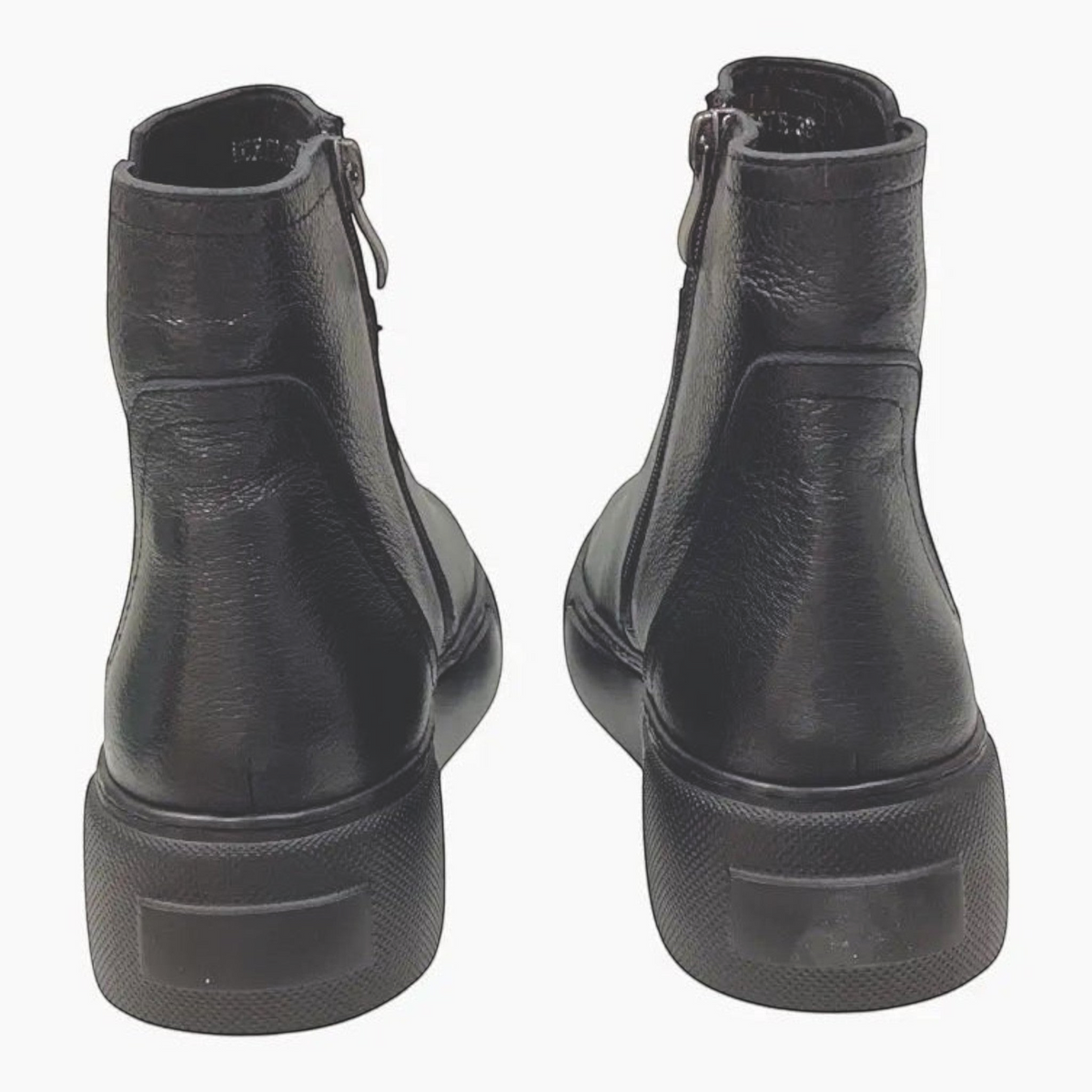 The Shoe Shop Belle Scarpe Roxie black leather ankle boots featuring a 4cm platform sole and side zipper, back view.