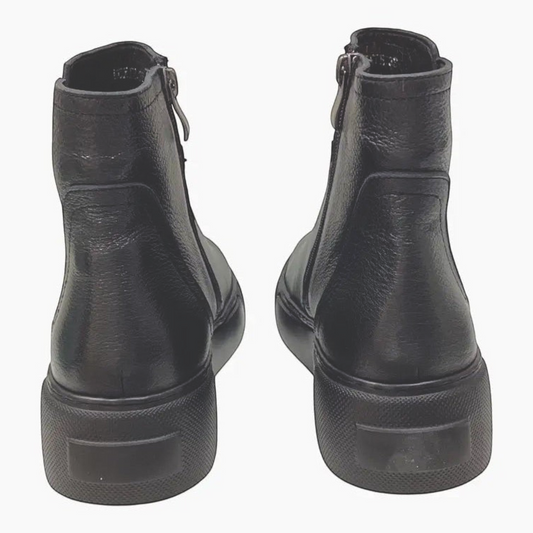 The Shoe Shop Belle Scarpe Roxie black leather ankle boots featuring a 4cm platform sole and side zipper, back view.