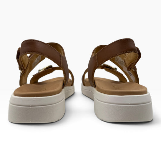 Back view of The Shoe Shop Bettina sandals in brown leather with a white platform sole and adjustable ankle strap.