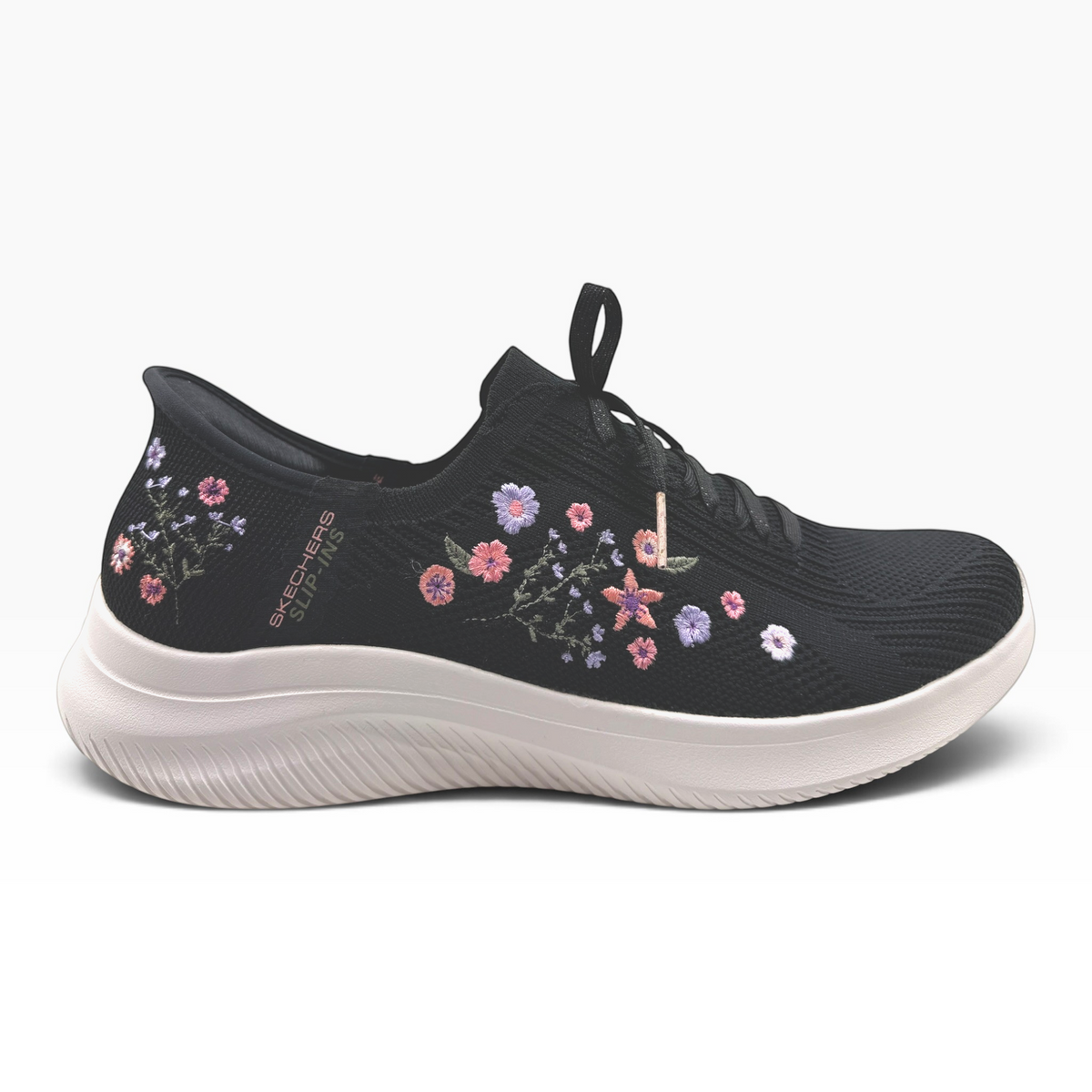 The Shoe Shop Skechers Ultra Flex 4.0 Sweet Petals black slip-on sneaker with floral embroidery and white sole.