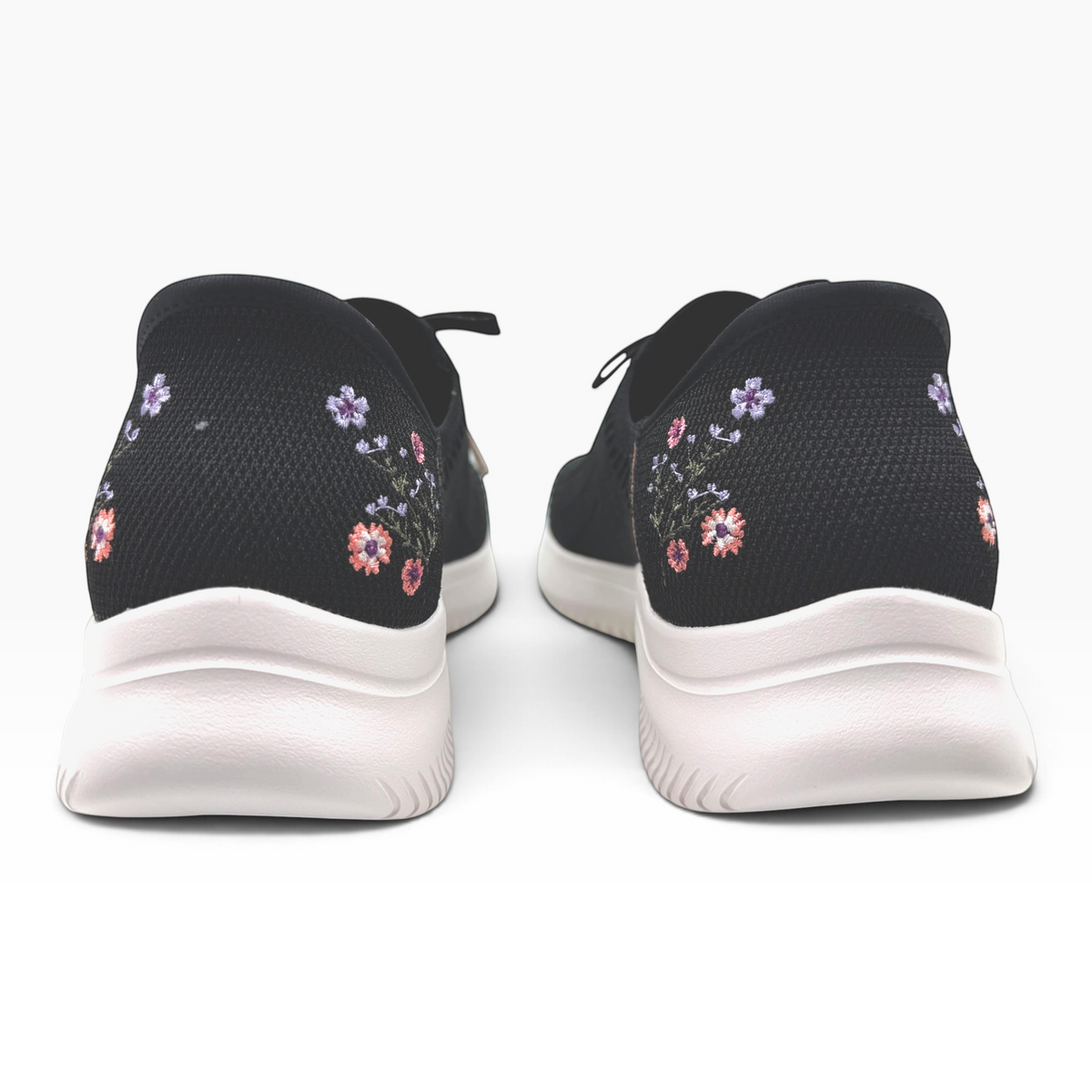The Shoe Shop Ultra Flex 4.0 Sweet Petals black slip-on sneakers with floral embroidery and white flexible soles