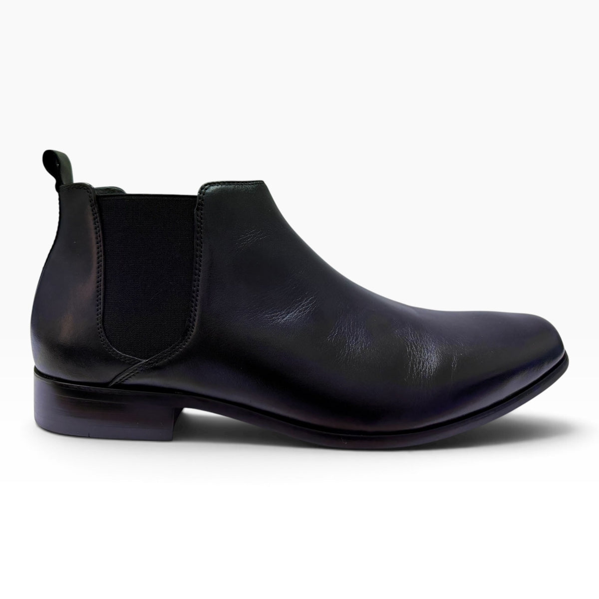 The Shoe Shop Kick Boot in black leather with elastic side gussets and a pull tab in a sleek Chelsea boot style.