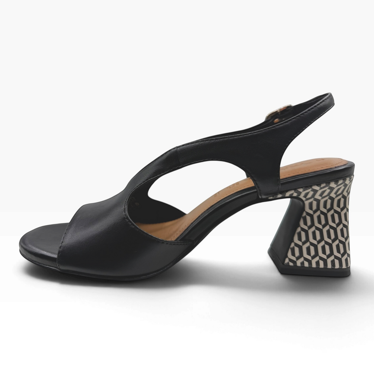 The Shoe Shop black leather heeled sandal with an open toe, adjustable slingback, and patterned geometric block heel.