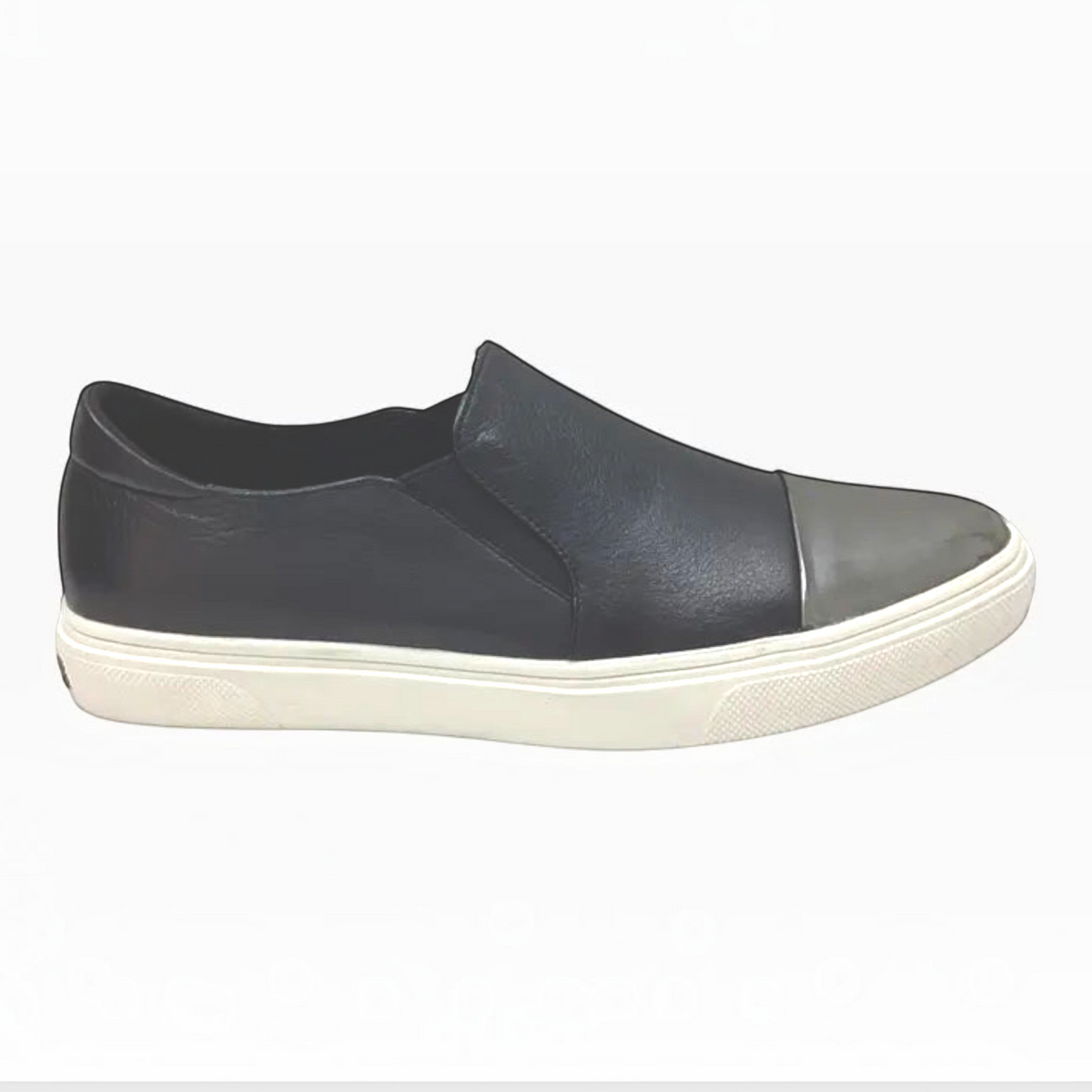 The Shoe Shop Icecap black leather slip-on sneaker with a metallic toe cap and white rubber sole.