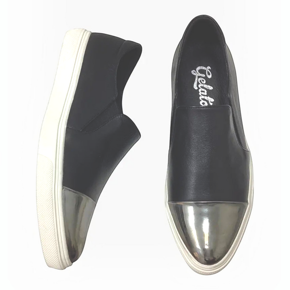 The Shoe Shop Icecap black leather slip-on sneakers with a metallic silver toe cap and white rubber sole.