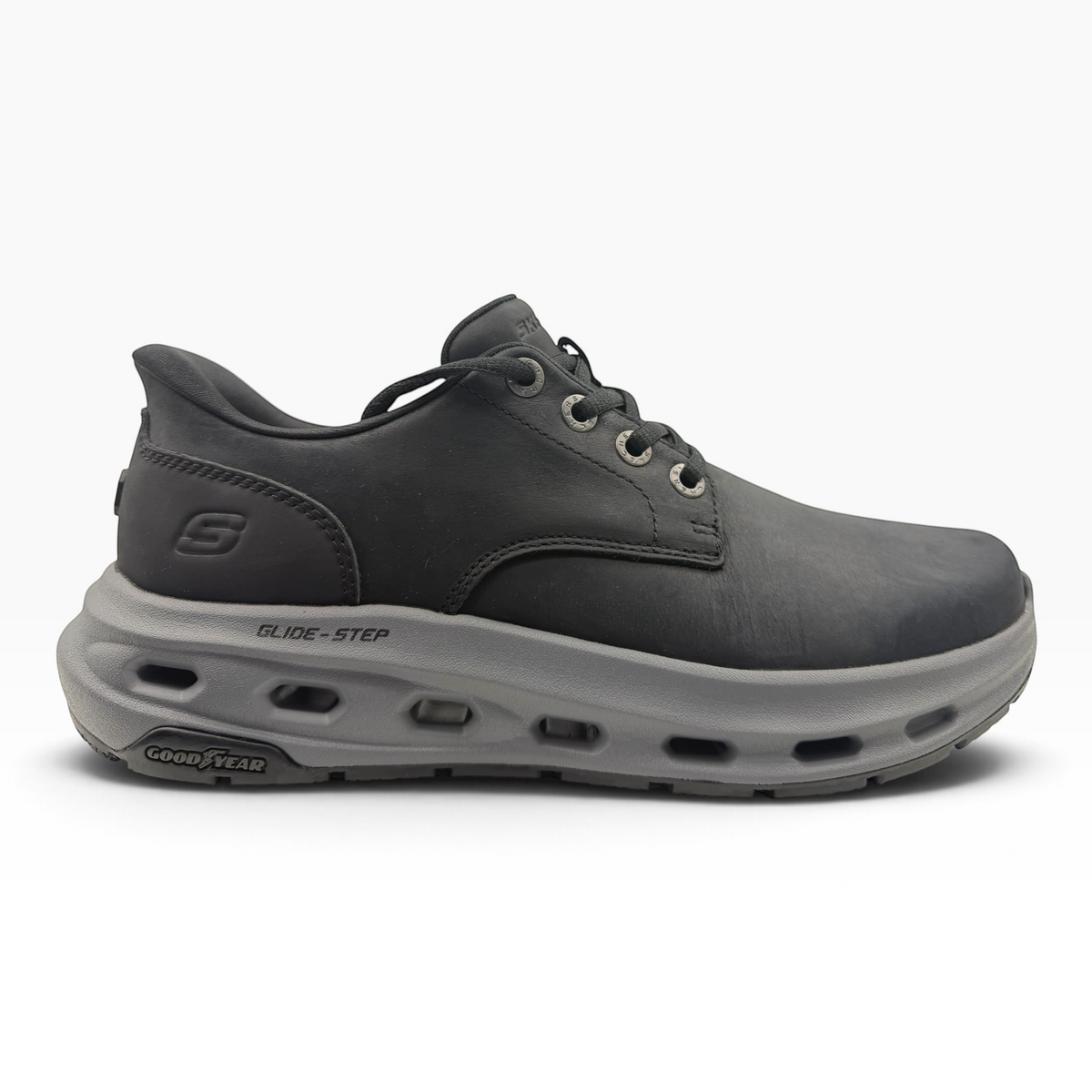 The Shoe Shop Glide Step Cade Ox sneaker in black leather with a grey cushioned Goodyear performance outsole.