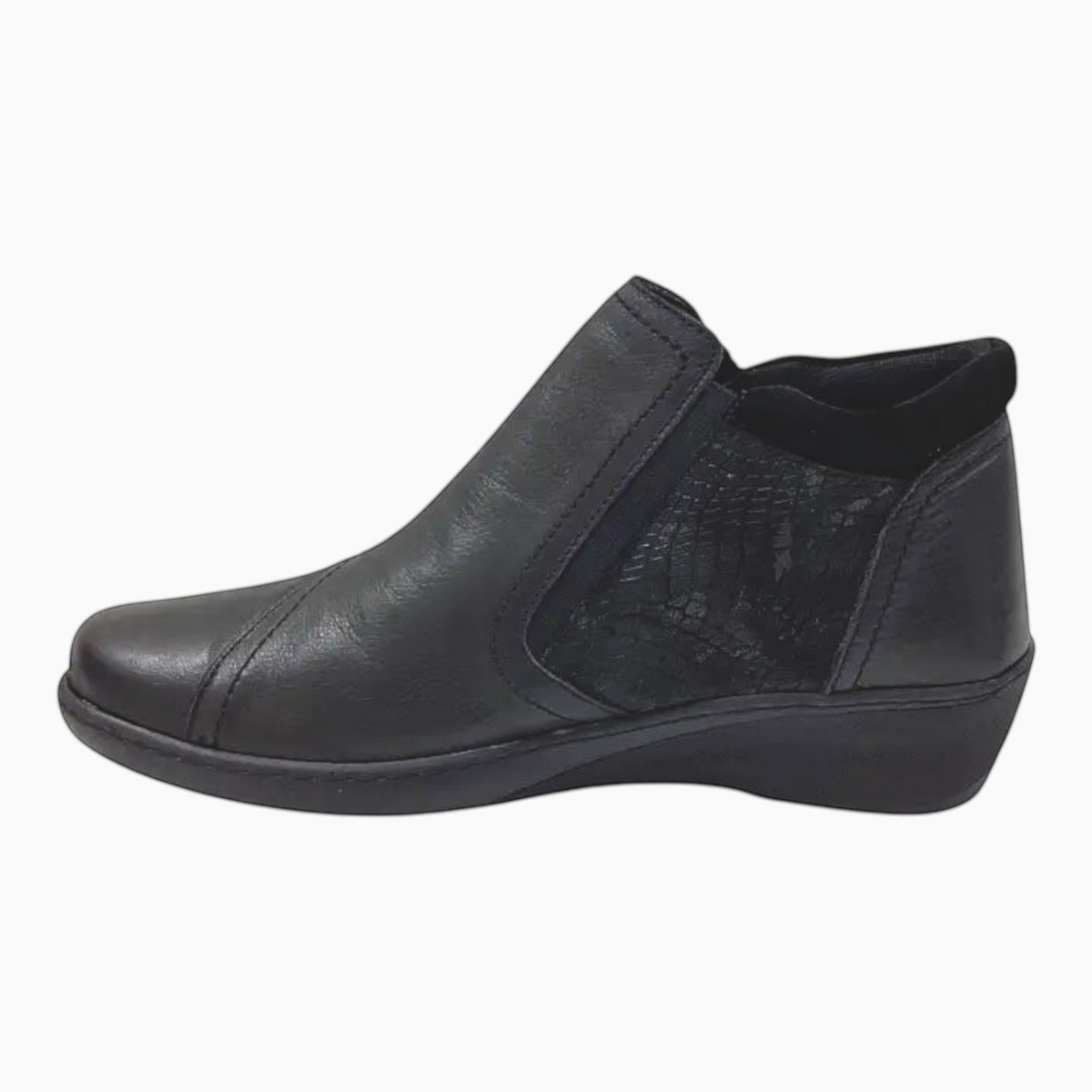 The Shoe Shop CP462-18 black leather ankle boot with patterned side detail, elastic gusset, and comfortable wedge heel.