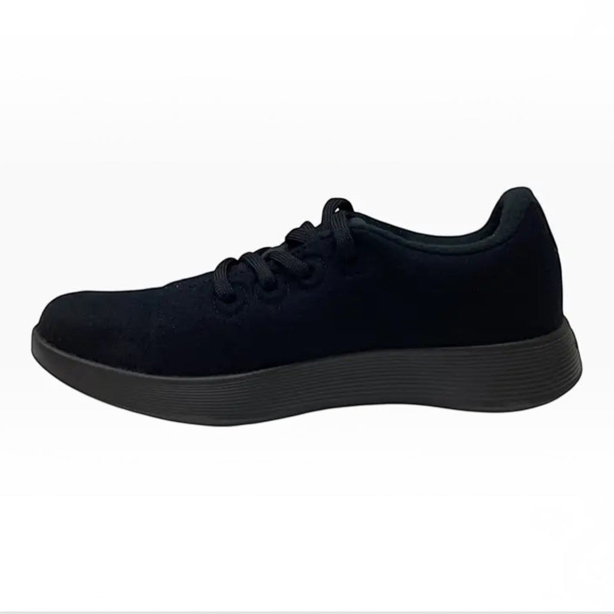 The Shoe Shop Wool Runner sneaker in black featuring a soft Merino wool upper and a lightweight cushioned sole.