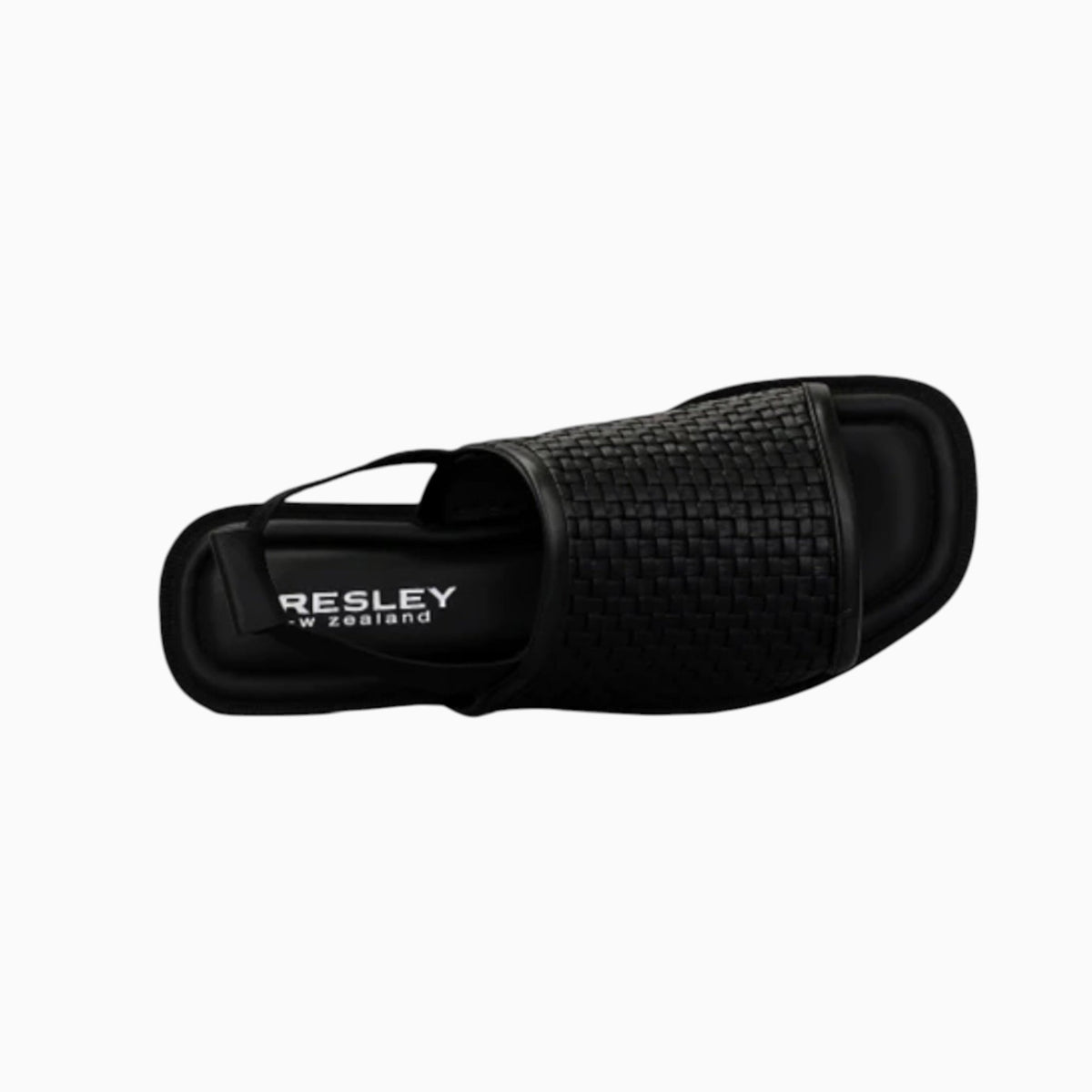 The Shoe Shop Snob black woven leather slingback sandal with a comfortable flat slip-on design