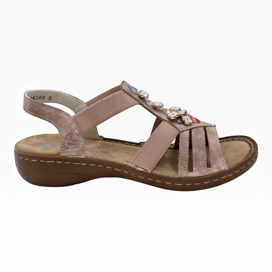 The Shoe Shop Rieker blush pink suede leather sandal with elastic straps and decorative multi-colour gem accents.
