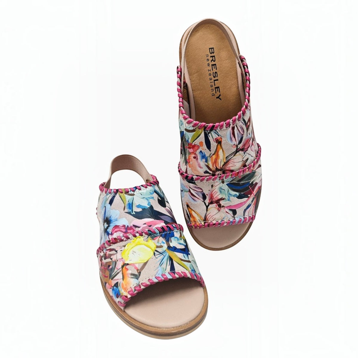 The Shoe Shop Bresley Serenade floral suede sandals with pink whipstitch detailing and open back design.