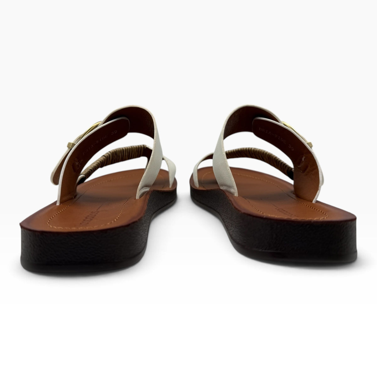 The Shoe Shop Bria Wide white leather sandals with brown platform soles and gold buckle detail, back view