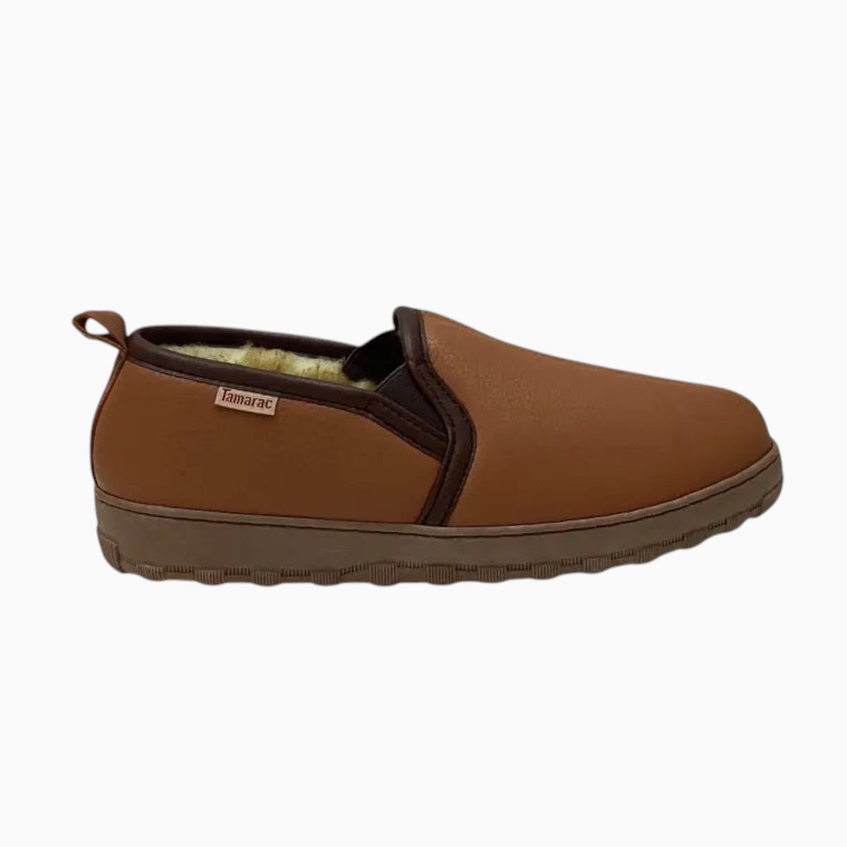 The Shoe Shop Tamarac deerskin leather slip-on slipper in brown with a warm fleece lining and rubber outsole.