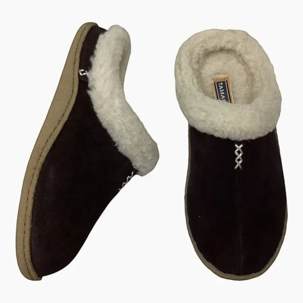 The Shoe Shop Tamarac Euro clog slippers in dark brown leather with a warm cream wool lining and crepe sole.