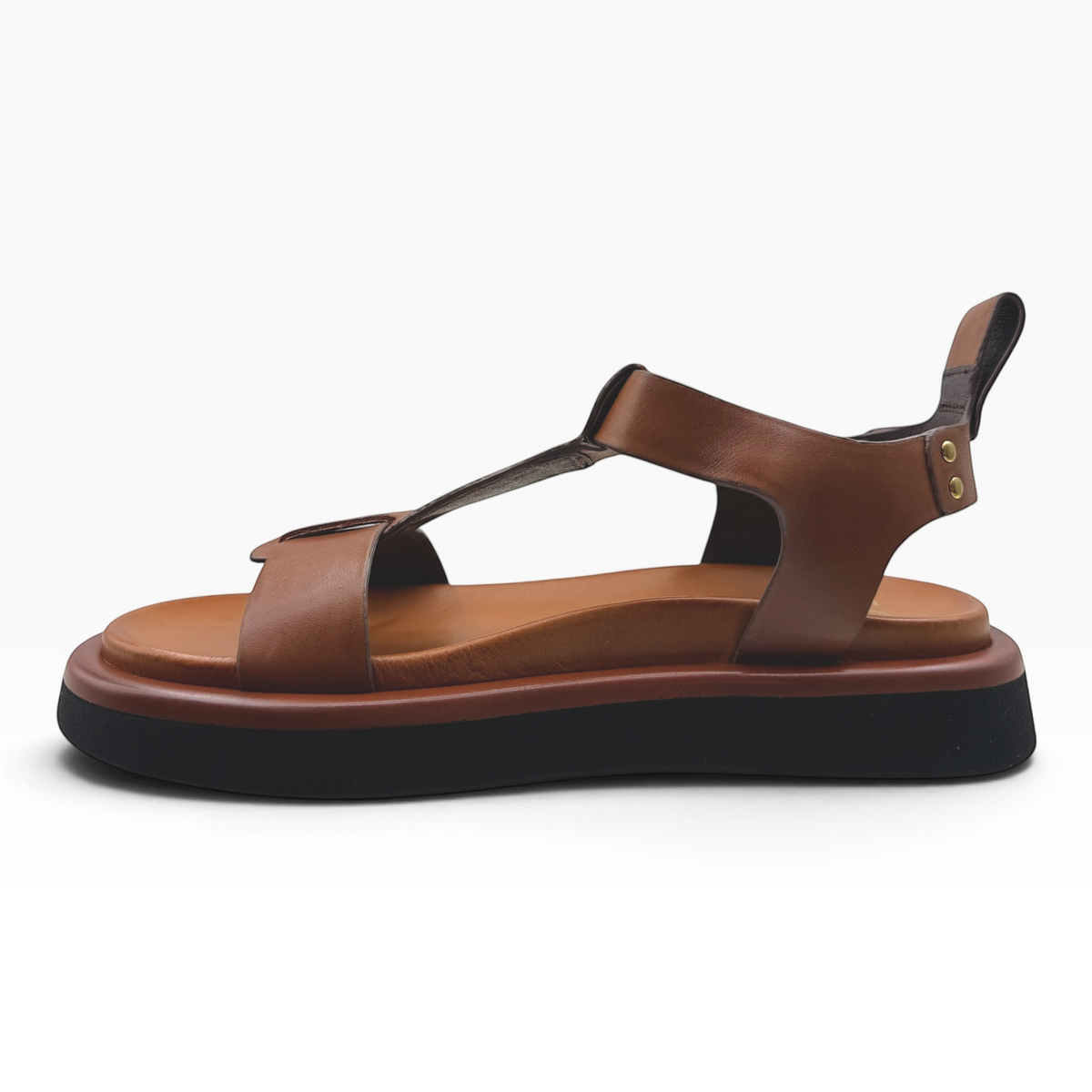 The Shoe Shop Slays brown leather platform sandals with a T-strap design and thick black rubber sole