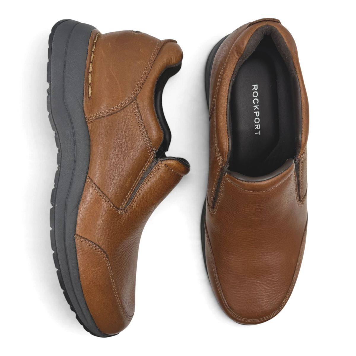 The Shoe Shop Edge Hill brown leather slip-on shoes with dark grey soles, top-down view