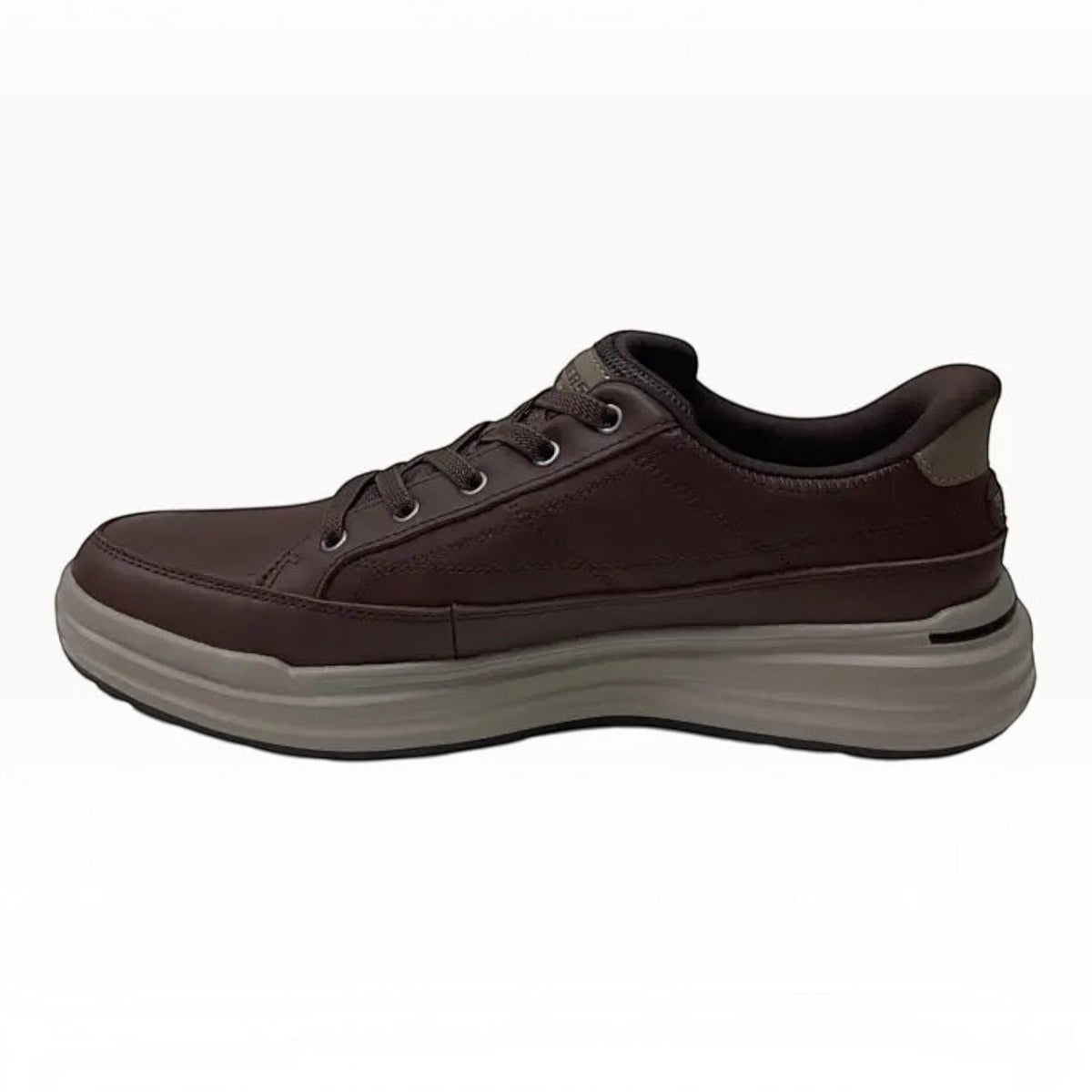 The Shoe Shop Skechers Sterling-Hansel brown leather slip-on sneaker with a thick cushioned sole and stretch laces.