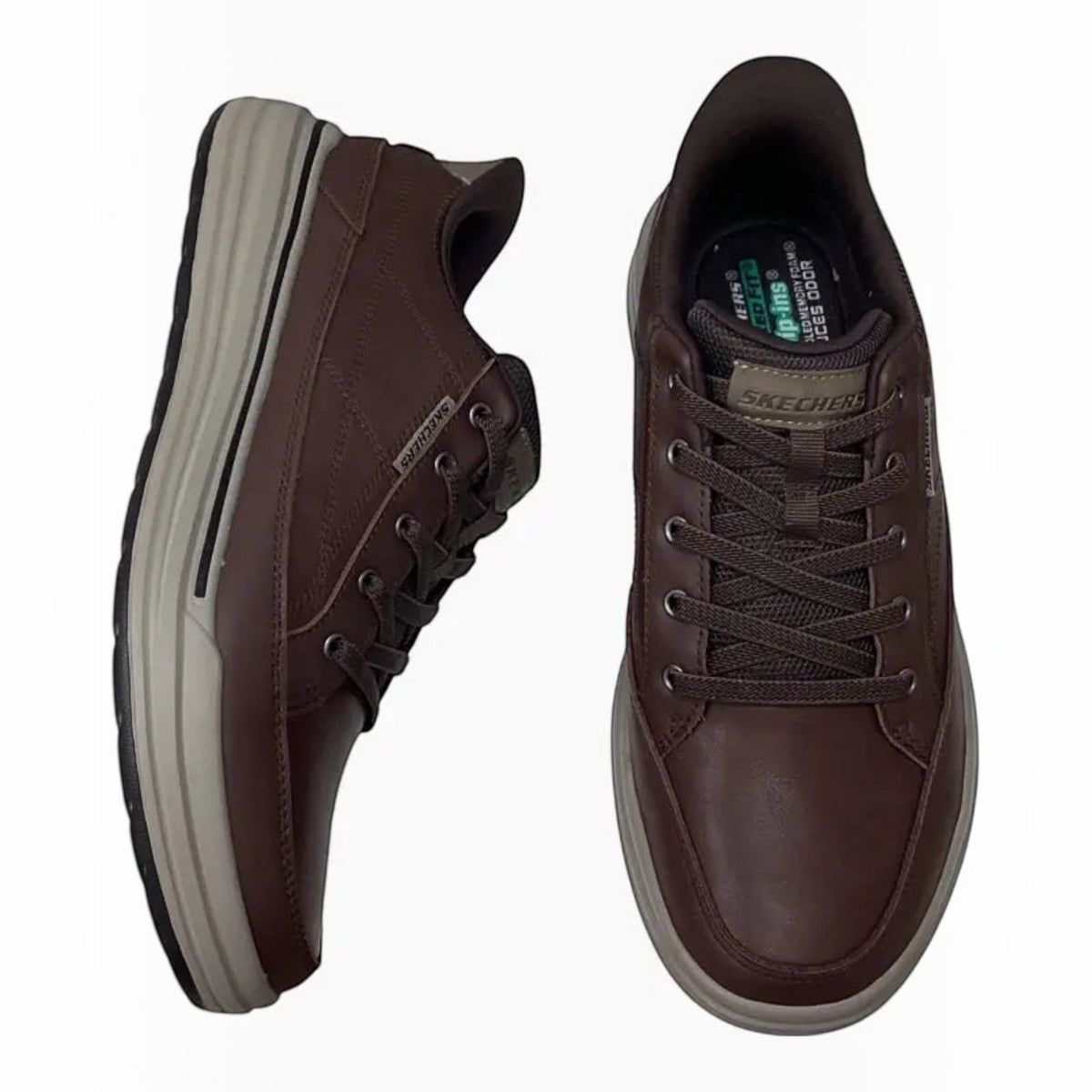 The Shoe Shop Skechers Sterling-Hansel brown leather slip-on sneakers with memory foam insoles and stretch laces.