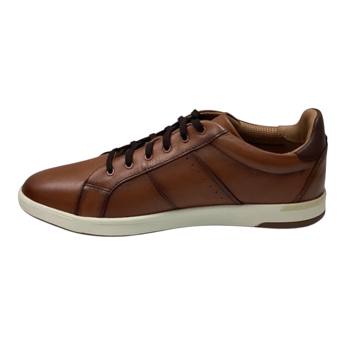 The Shoe Shop Crossover Lace sneaker in brown tumbled leather with a white rubber sole and dark brown laces.