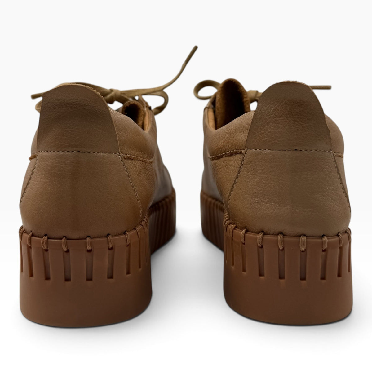 The Shoe Shop Bump cognac brown leather lace-up shoes with a thick, textured platform sole, rear view.
