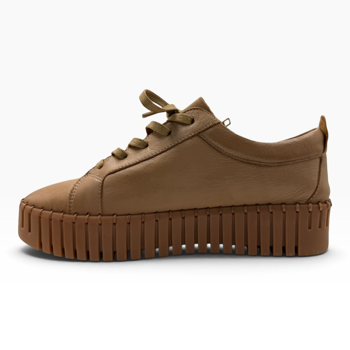 The Shoe Shop Bump cognac brown leather platform sneaker with a chunky ribbed rubber sole and matching laces.