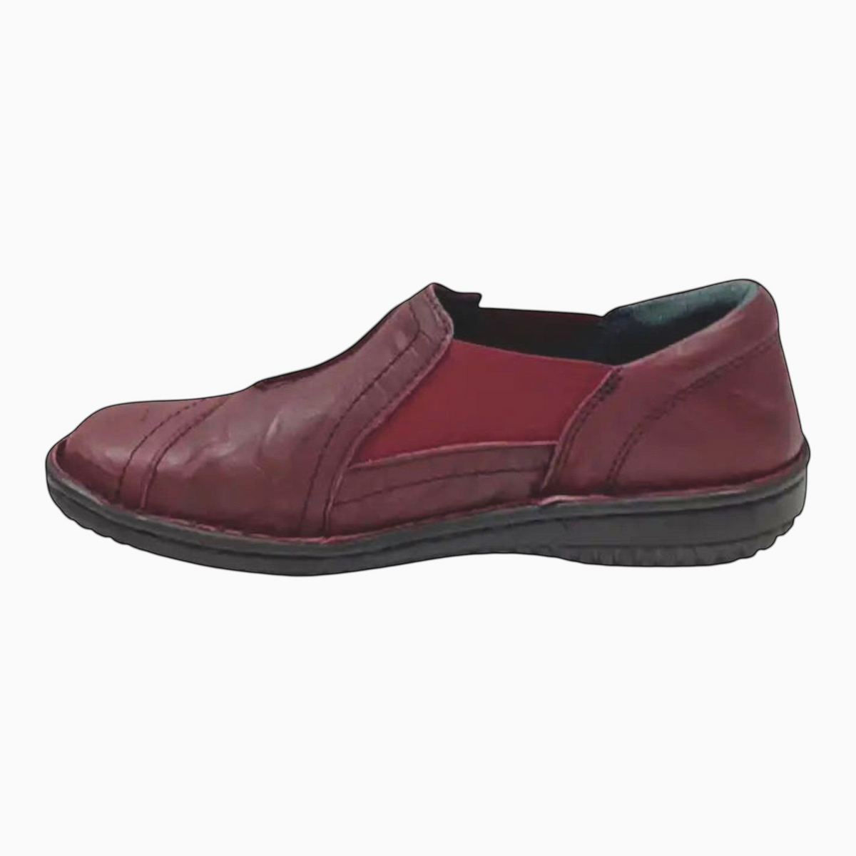 The Shoe Shop Cabello burgundy leather slip-on shoe with elastic gussets and a flexible sole for orthotic comfort.