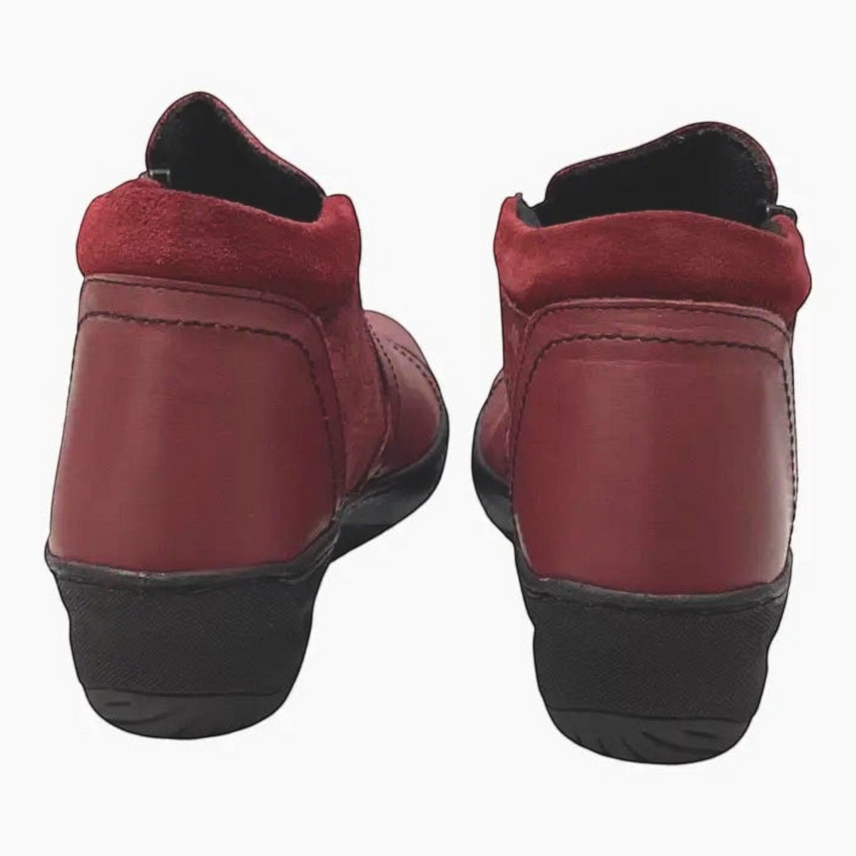 The Shoe Shop CP462-18 burgundy leather ankle boots with padded heel collars and black wedge soles, rear view.