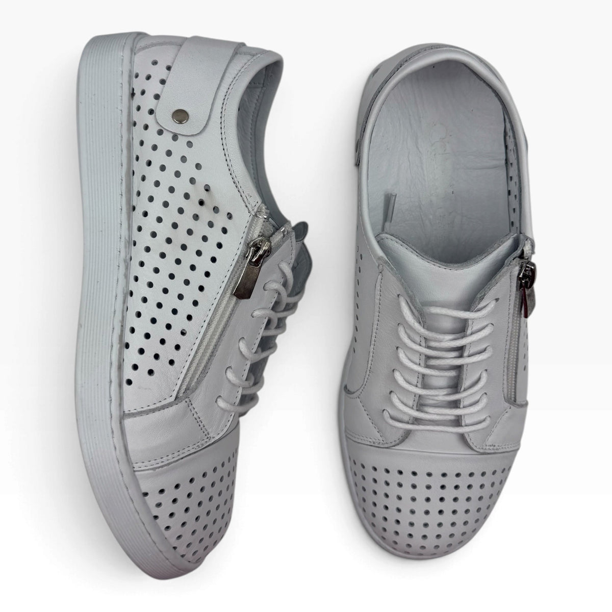 The Shoe Shop Cabello EG17 grey leather sneakers with punched upper, side zip, and lace-up closure.