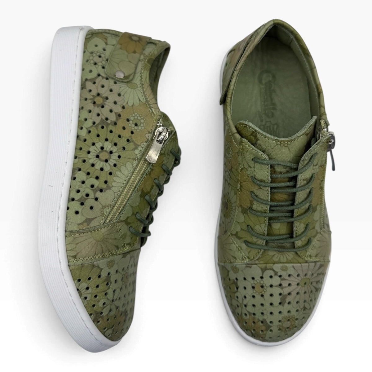 The Shoe Shop Cabello EG17 olive green floral leather sneakers with side zip, lace-up closure, and white rubber sole.
