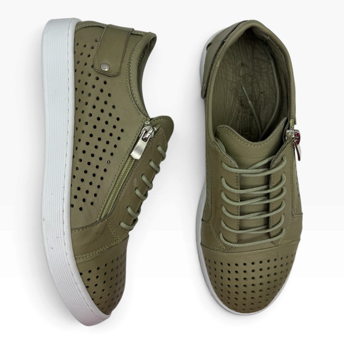 The Shoe Shop Cabello EG17 olive green leather sneakers with punched upper, side zip, and white rubber sole.