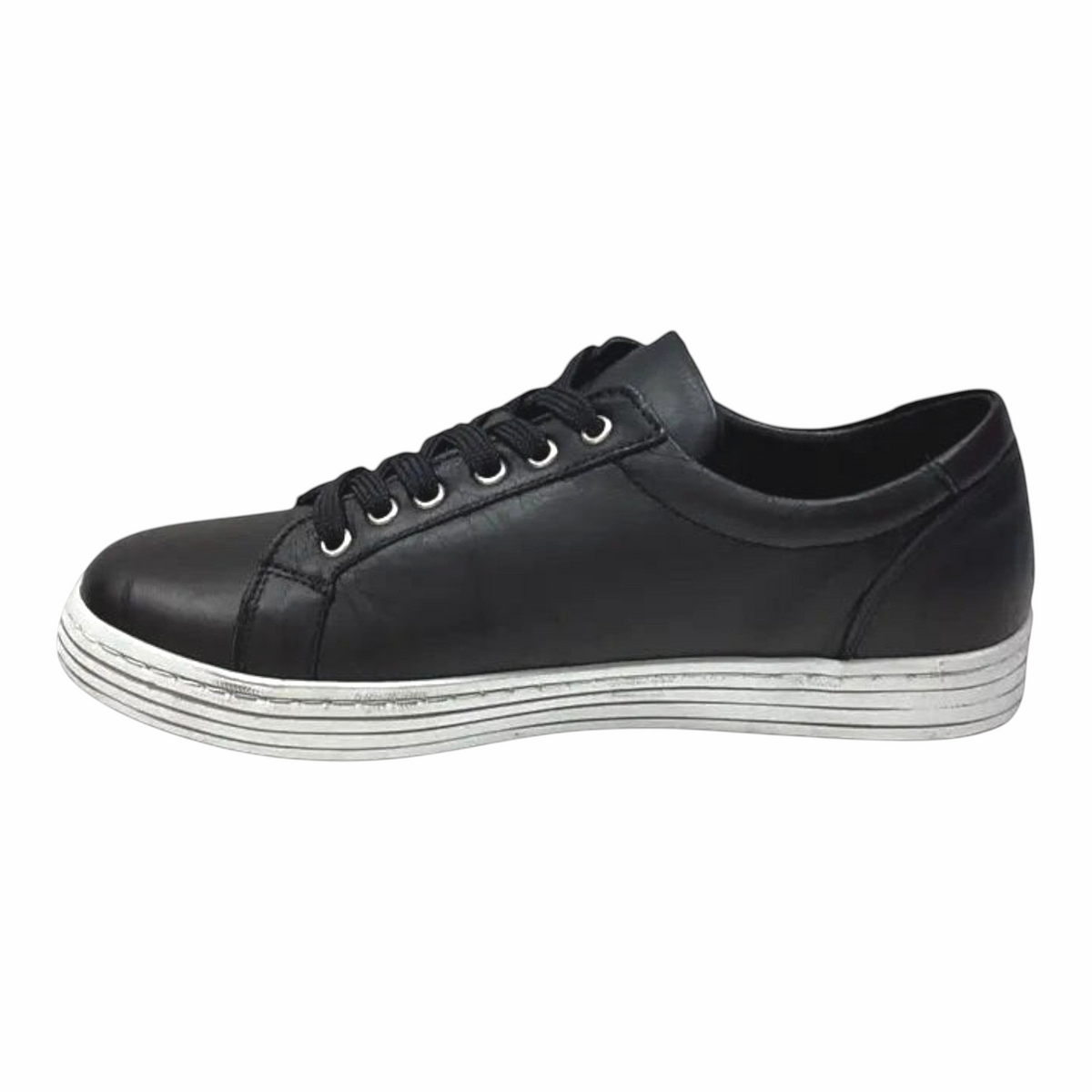 The Shoe Shop Cabello Unity black leather sneaker with lace-up front, side zip, and white textured thermo sole.