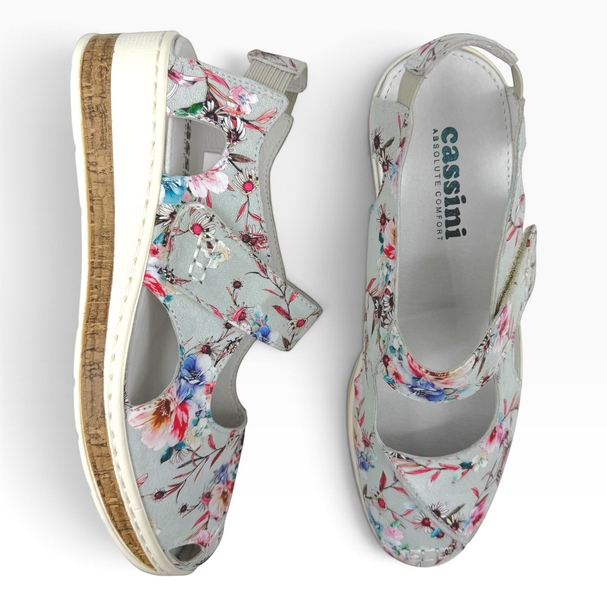 The Shoe Shop Cassini Maizy floral leather sandals with adjustable straps, peep-toe, and cork-effect wedge midsole.