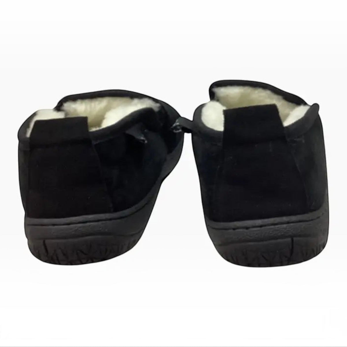 The Shoe Shop Charlie black suede slippers with plush sheepskin lining and durable TPR soles, rear view.
