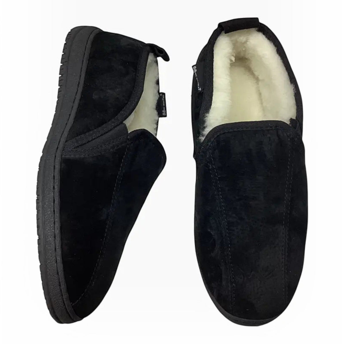 The Shoe Shop Charlie black suede sheepskin slippers with plush white wool lining and durable TPR soles.